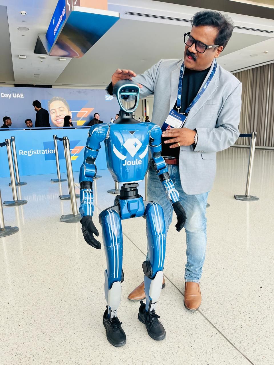 SAP Joule humanoid robot at SAP Connect Day UAE 2026 registration area — a physical representation of SAP's agentic AI direction