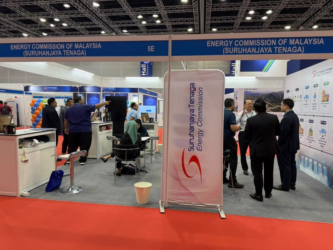 Energy Commission of Malaysia (Suruhanjaya Tenaga) booth at ISES 2026 discussing energy policy and regulatory frameworks with attendees