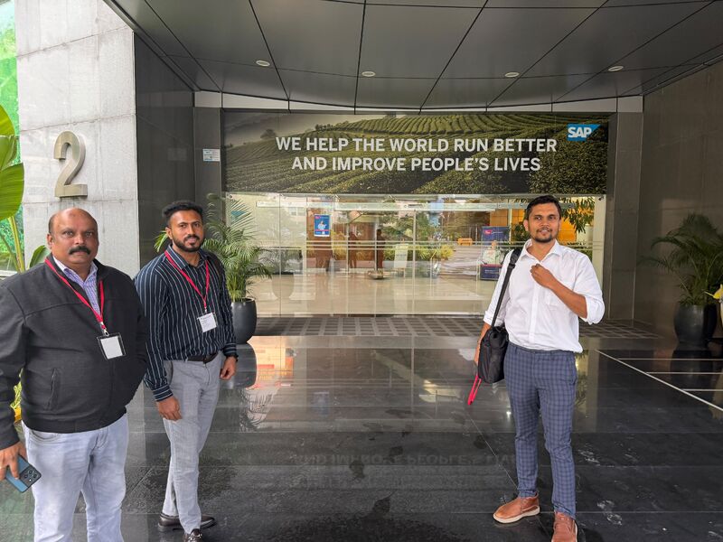 SAVIC leadership team at the SAP Labs entrance, reflecting on SAP's mission to help the world run better through Business AI